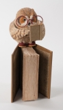 Owl on a book by D. Robidoux